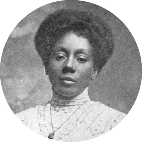 Elizabeth Carter Brooks, wearing her hair up, with a fancy high-necked top and a necklace. The photo is in black and white.